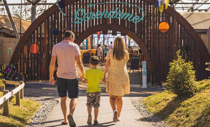 An image of a family walking into the Serendome during the Summer Festival celebrations.
